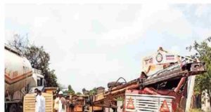 Accident crane overturned on the road while lifting the container