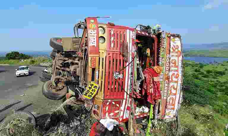 Accident truck carrying chemical powder overturned in the ghat