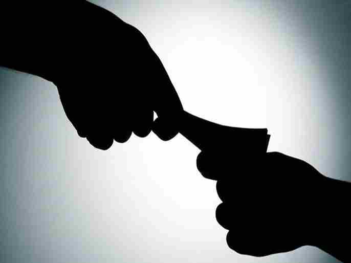 clerk was caught red-handed while accepting a bribe of 50,000 