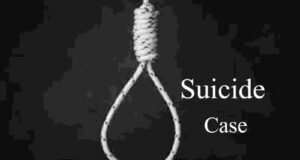 young man committed suicide by hanging himself from a tree in the field