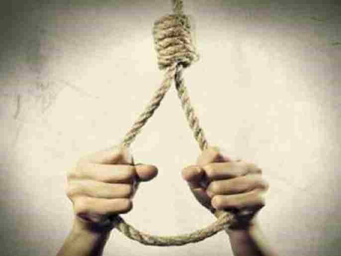 A farmer committed suicide by hanging himself from a tamarind tree